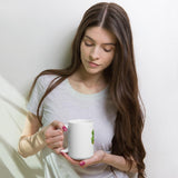 White glossy mug smiski design